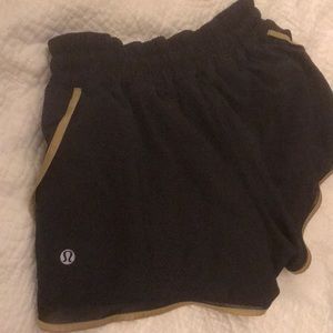 Lulu Black and gold running shorts